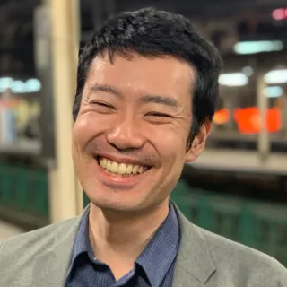 代表 行政書士 佐小田 仁の顔写真
